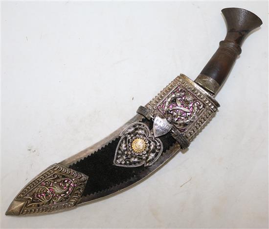 A kukri with silver mounted scabbard, overall 14in.